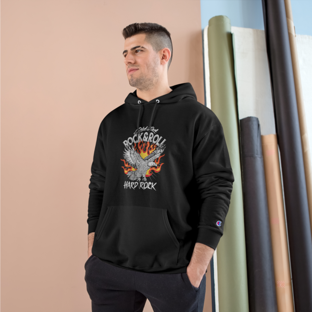 A man in a black hoodie with a “Rock&Roll”, an illustrated eagle, and a “Hard Rock” print.
