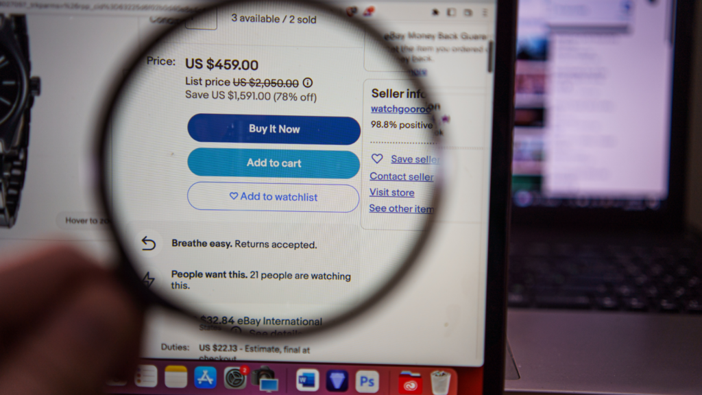 An eBay listing under a magnifying glass.